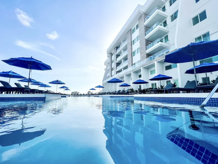 NEW 3 BR 3 BA Condo at SUNSET CARIBE RESORT Unit 206 Pool View - Image 1