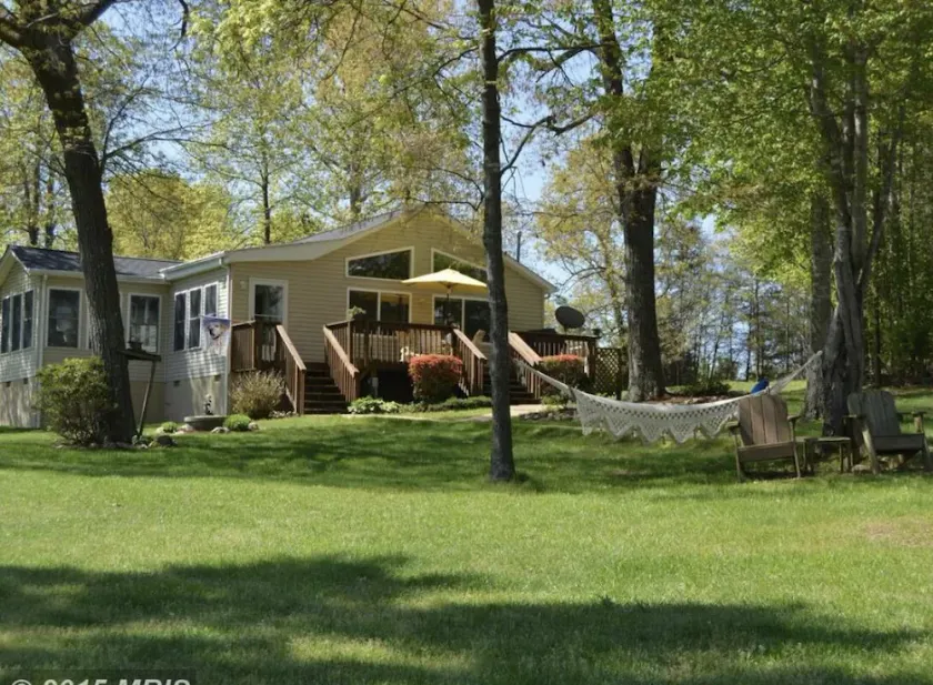 GO JUMP IN THE LAKE at this lovely waterfront home! - Image 1