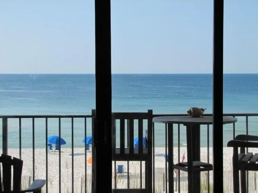 Gulf front condo with great views shared pools & beach access - Image 1