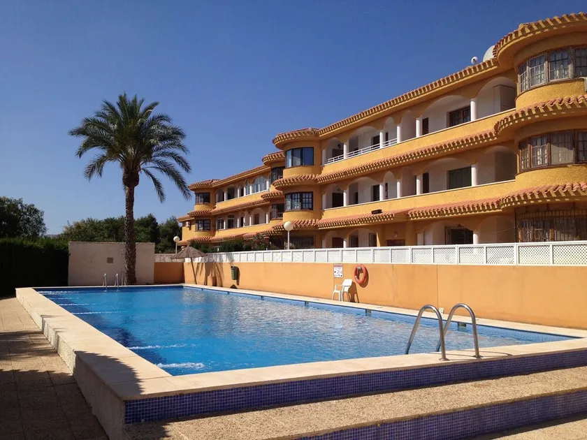 Ground floor apartment with 20m shared, key-only-access pool directly in front.  - Image 1
