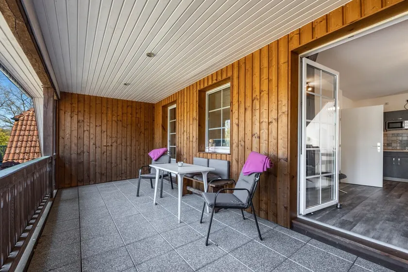 Apartamento 'Haus Wacholder Wohnung 1' com jardim partilhado, varanda e acesso Wi-Fi - Image 1