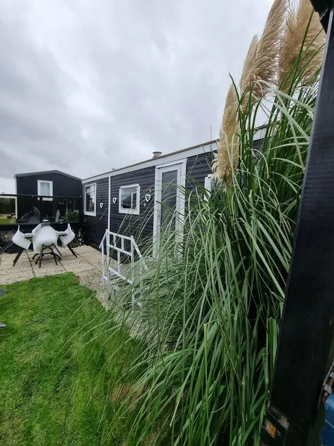 Dream location with a view of the Wadden Sea (50 m away), beach (400 m away), Mobile Home TinyHouse  - Image 1