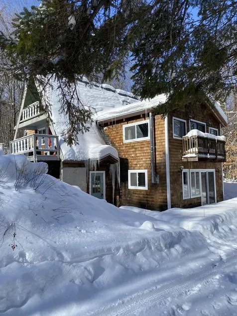 Peaceful Near Mt Snow Wood Stove Sauna Forest Views Cozy Stay - Image 1