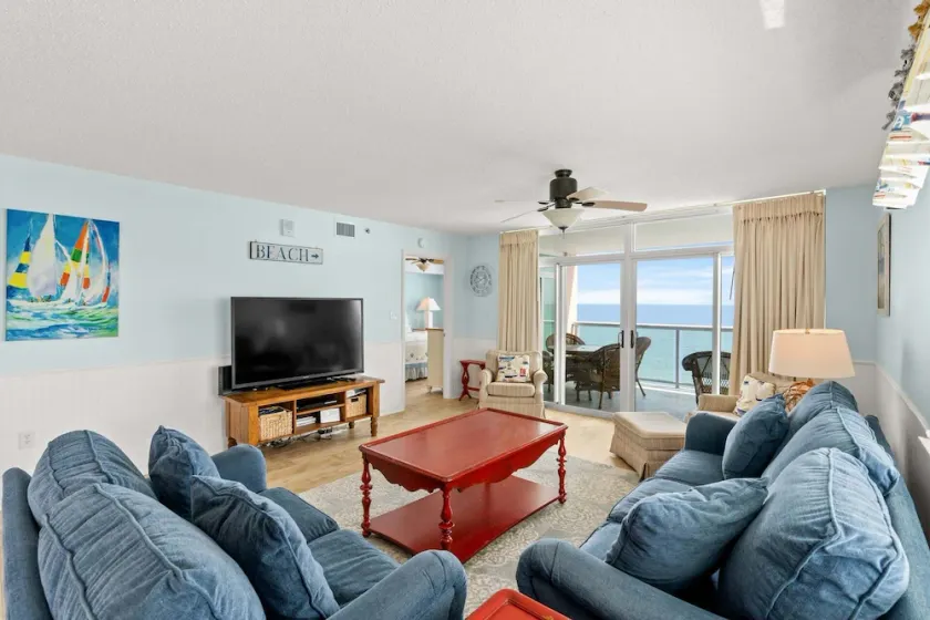 Bright and cheery oceanfront 4-bedroom condo | Blue Water Keyes - 1207 - Image 1