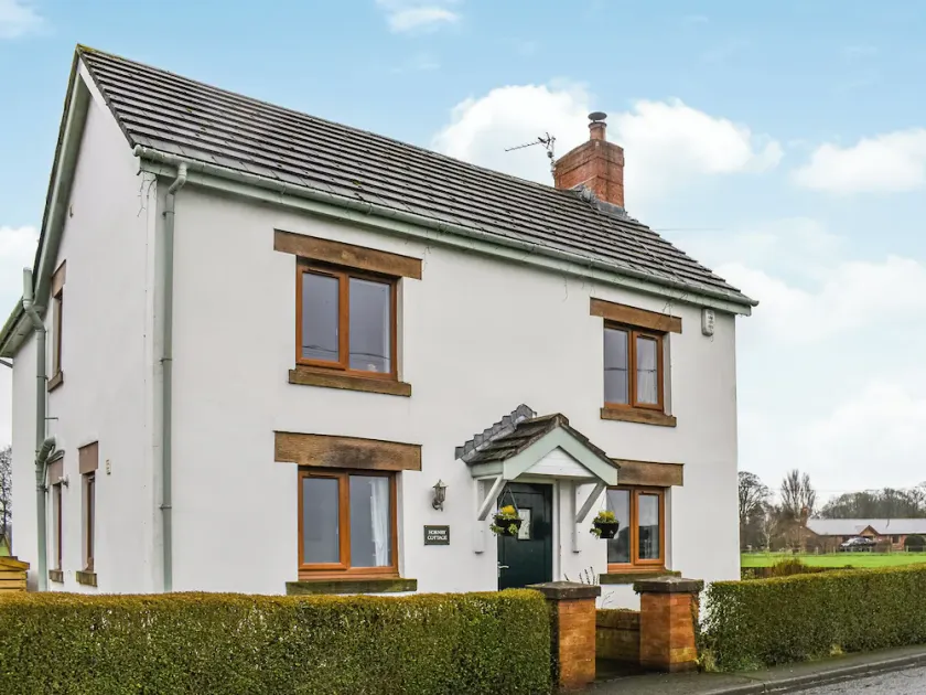 Boasting a private garden, stunning views and ample parking. - Image 1