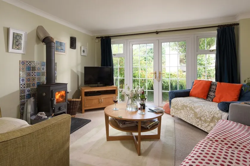 A cosy cottage with a woodburner - Image 1