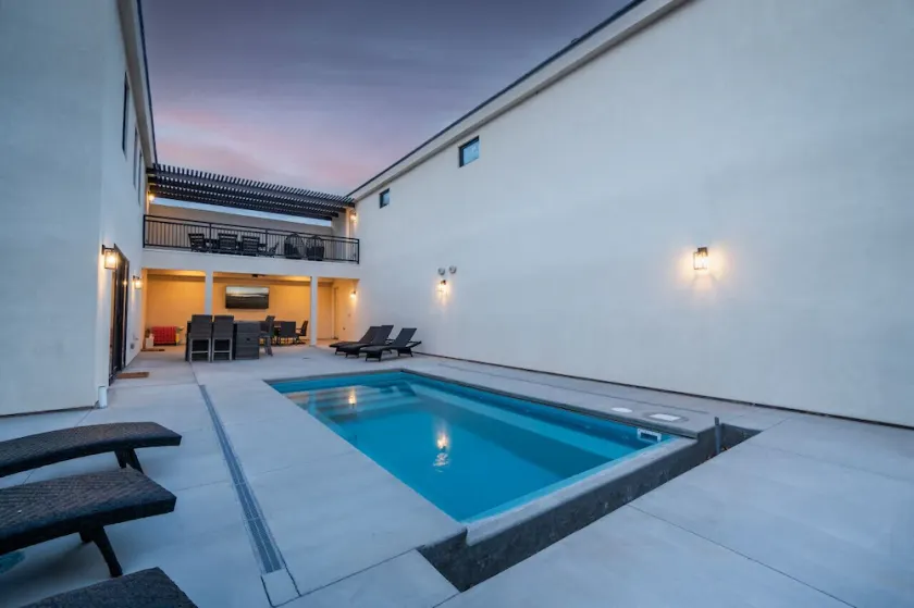 Spacious Brand New Home! Lots of courtyard space and fun for all. - Image 1