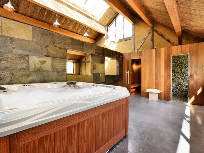 Pleasant Holiday Home in Erezée Ardennes with Hot Tub, Sauna - Image 1