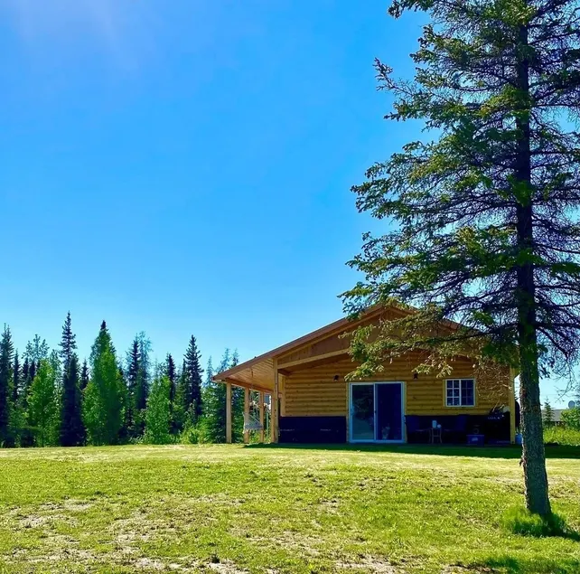 Newly constructed cabin on a quiet residential pond. - Image 1