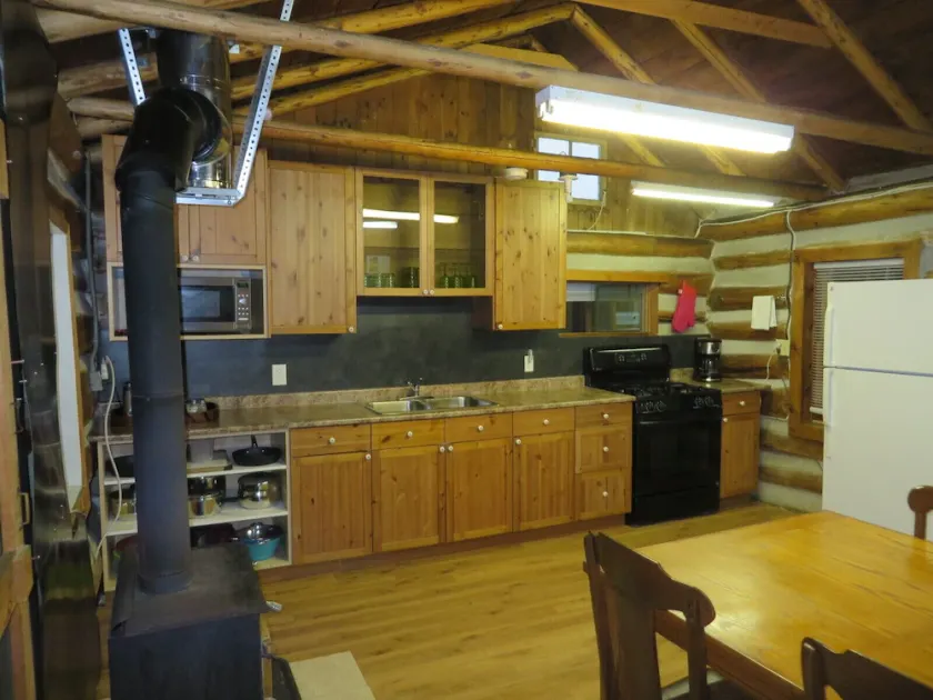 Rustic Lakeside Log Cabins - Image 1