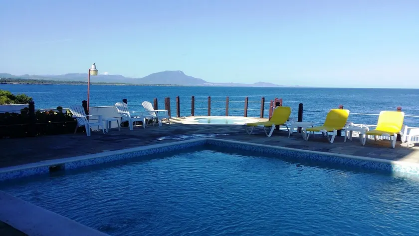 Oceanfront 2-bedroom apartment in central Sosua, on a long sandy beach - Image 1