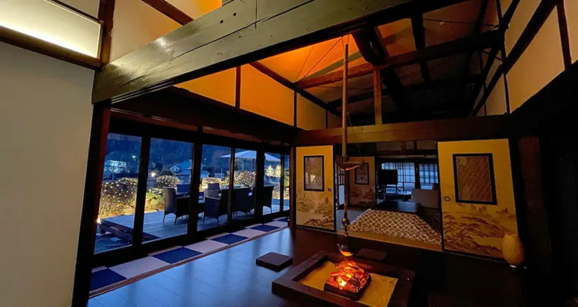 A house with a hearth surrounded by Mt. Fuji and Yatsugatake. - Image 1