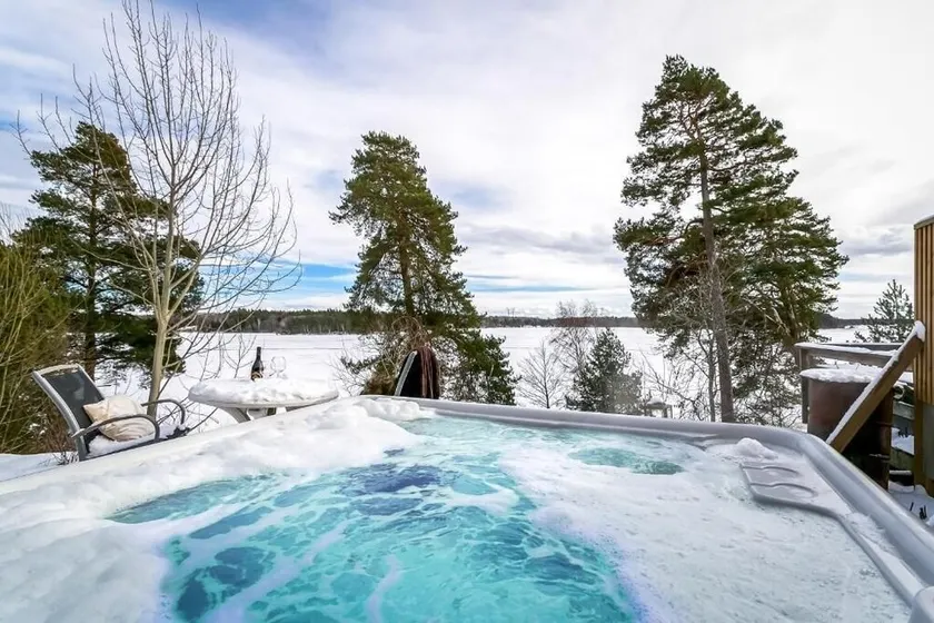 Waterfront Spa Retreat with Hot Tub - Image 1
