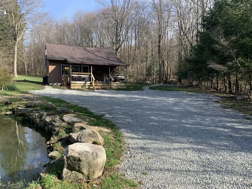 Cabin w/ Hot Tub on Small Pond - Image 1