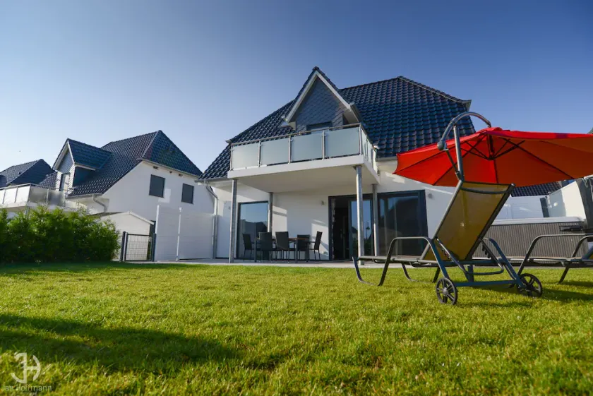 Villa Fleesenstrand am See | con idromassaggio esterno | Sky TV | Camino | sauna - Image 1