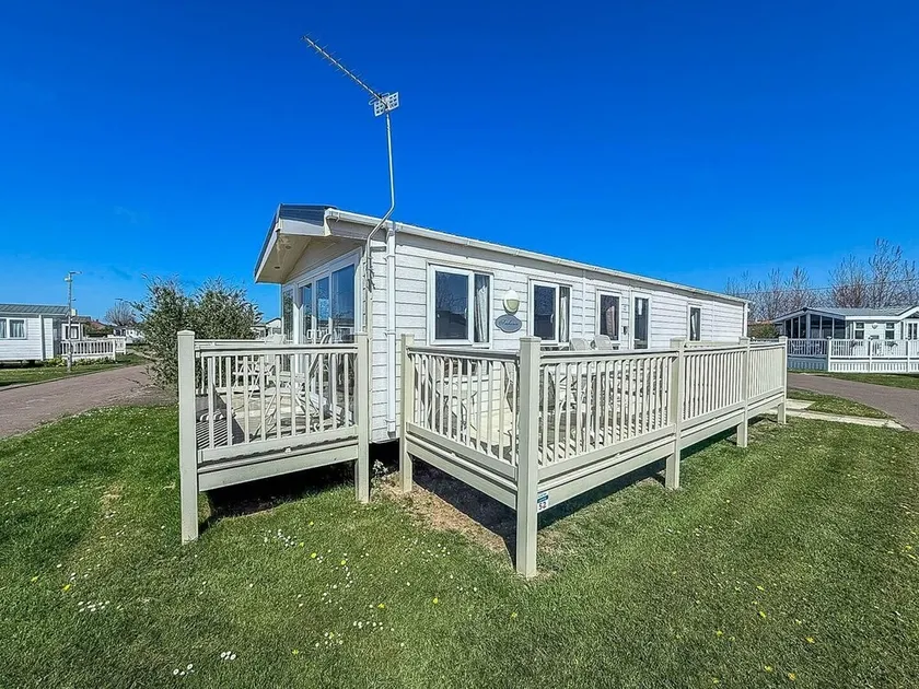 Beautiful Caravan With Decking At California Cliffs In Scratby Ref 50052L - Image 1