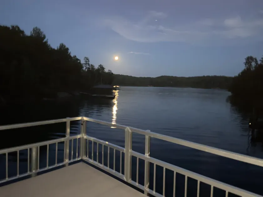 Lovely lakefront home with dock. Summertime stunner. Winter wonderland nearby. - Image 1