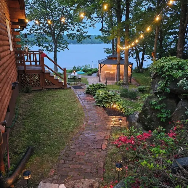 “Wake up to lake views, spend your days on the water, unwind by the fire.” - Image 1