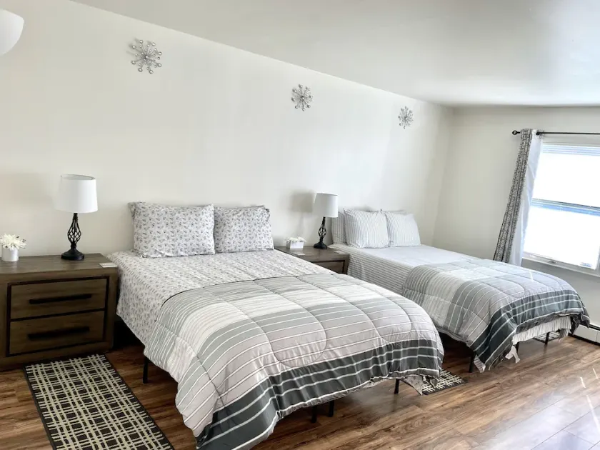 Comfy, Clean & Spacious w/2 TVs, parking, laundry  - Image 1