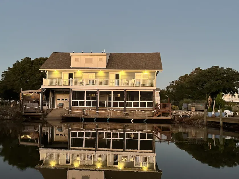 Beautiful home in quiet beach neighborhood on canal. Five minute walk to beach. - Image 1