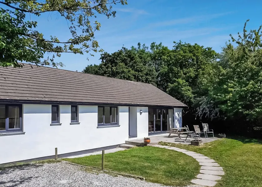 Single storey cottage in its own secluded setting away from the lodges. - Image 1
