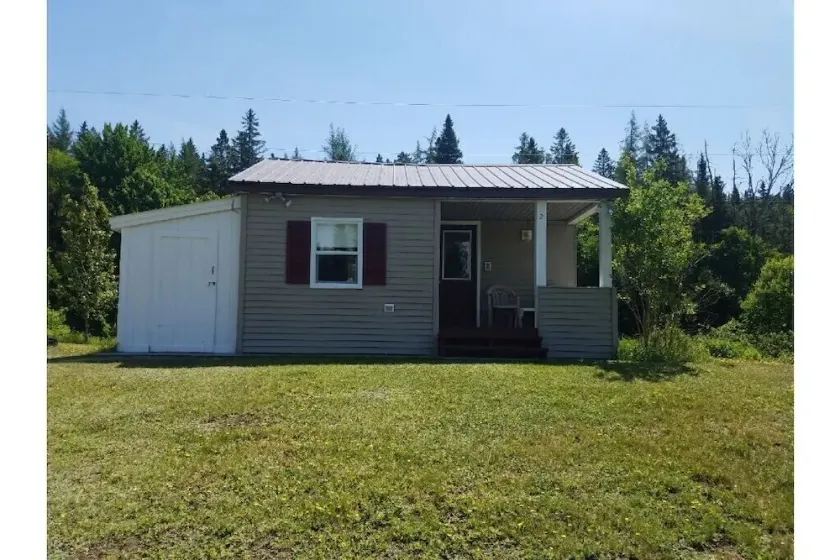 03) The Wolf Den Cabin - Image 1