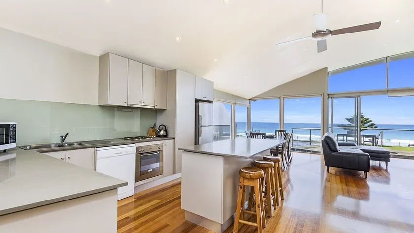 Located on the famous East Beach - Image 1