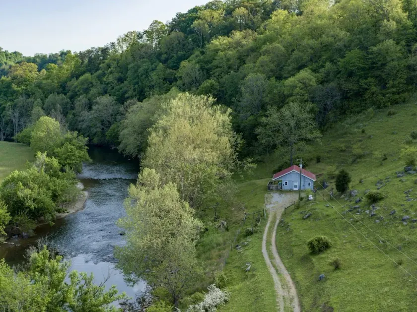 Cozy Riverfront Cabin - Image 1