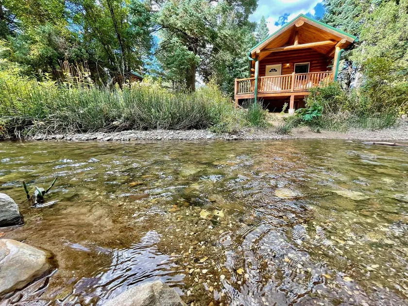 Secluded Creekside Cabins - Image 1