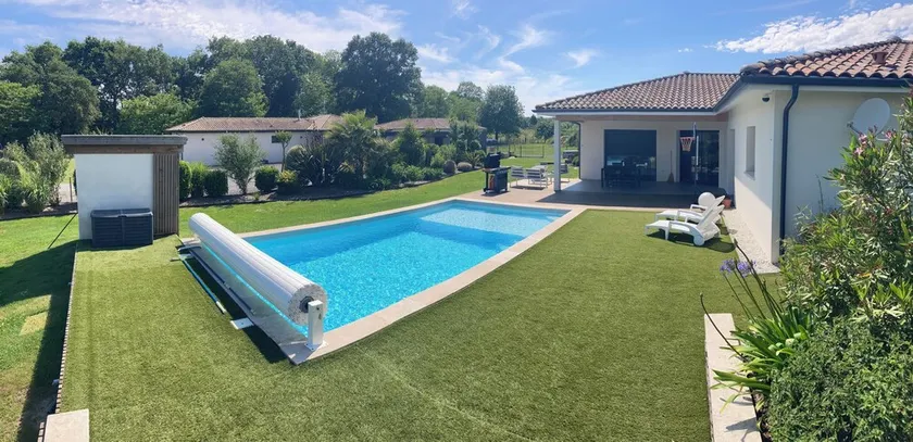 Contemporary family home with swimming pool - Image 1