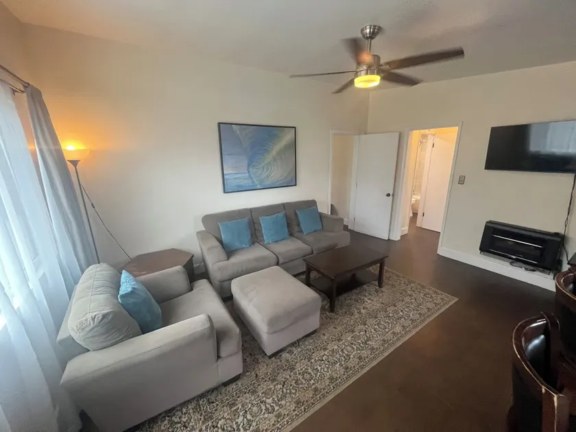 2Bd / 1Ba avec parking, terrasse, proche commerces et jetée. WiFi et TV directe - Image 1