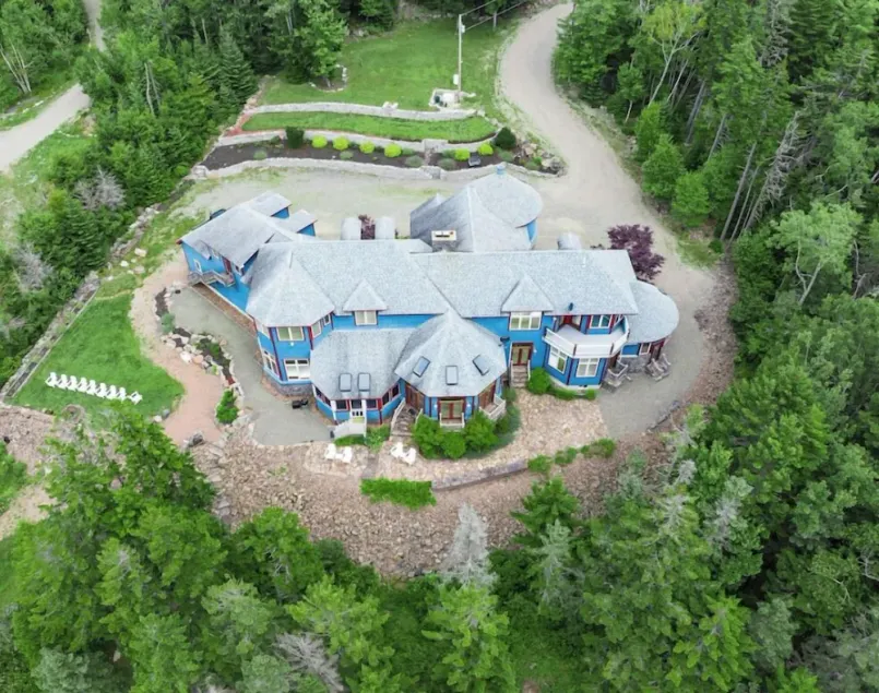 One-of-kind estate with unique & luxurious decor and wooded oceanside location. - Image 1