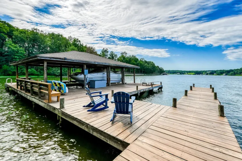 Lakefront home in private location with dock, firepit, game room & Pickleball - Image 1