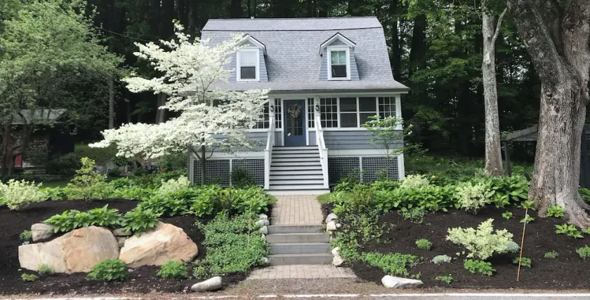Walk into town, soak up sun on enclosed porch & steps away from nature trails! - Image 1