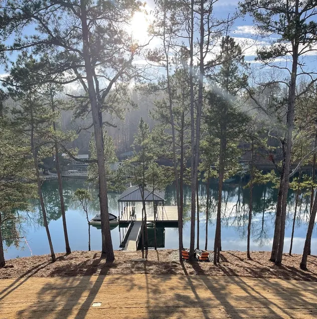 Large 5BR home on quiet cove. Pets welcome. Private dock. 3 fireplaces, firepit. - Image 1