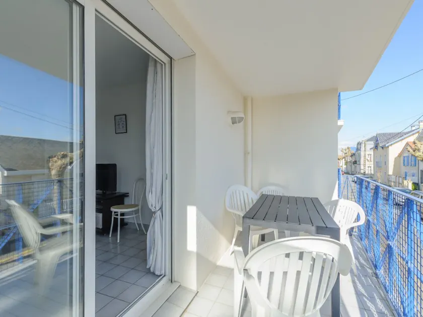 Cozy 1BR Apartment with Balcony, 50m from Beach, Near Shops & WiFi - Image 1