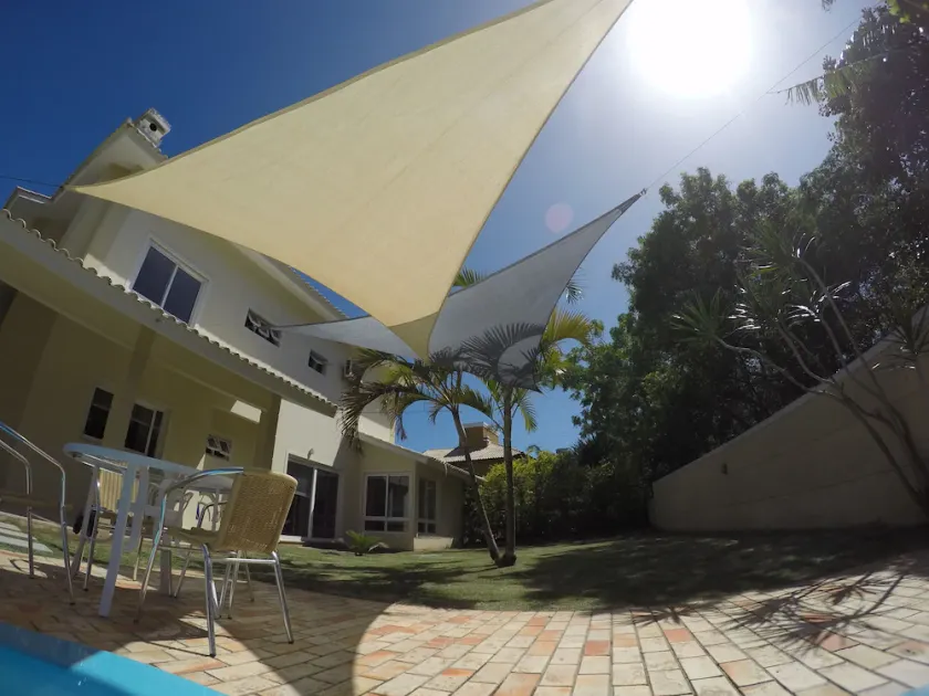 4-bedroom house in a gated community with an ecological trail to the beach. - Image 1