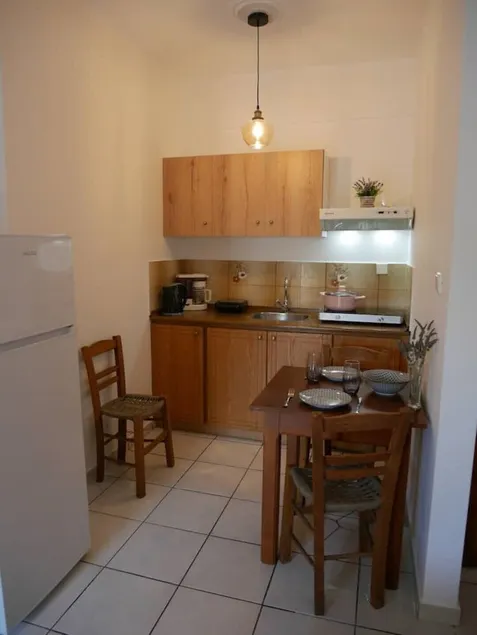 Chrysoula’s Welcoming Triple Room with Yard - Image 1