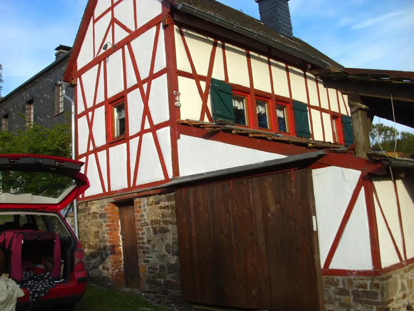 historic half-timbered house on the edge of a forest in a secluded location - Image 1