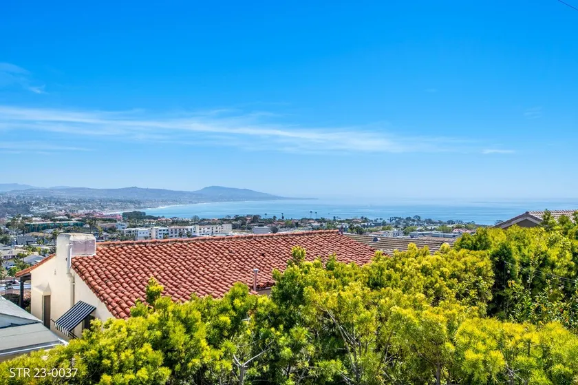Mid-century modern home with Epic Coastline Views! STR23-0037 - Image 1