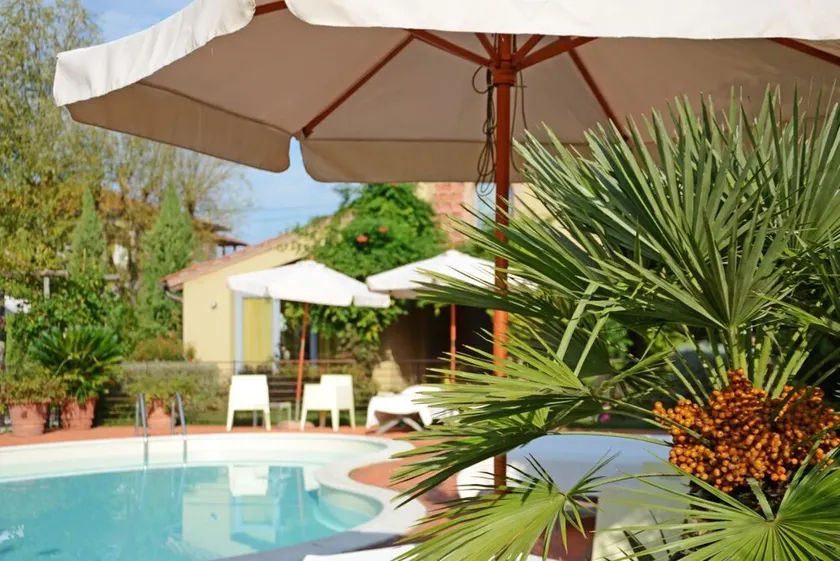 GuestHost - Large apartment of 70 sqm located on the first floor (stairs to access) of the renowned Residence La Mandolata, ideal for 2 people.The residence is located in Lido Camaiore and offers a shared swimming pool and large garden, ideal for relax - Image 1