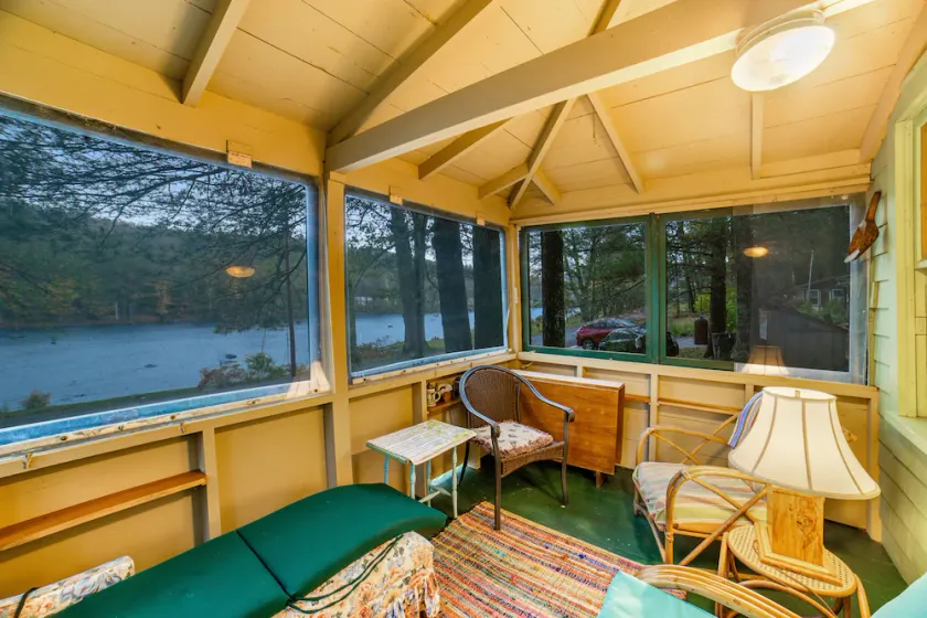 Classic riverfront cottage w/ beautiful water views, WiFi, & screened porches - Image 1