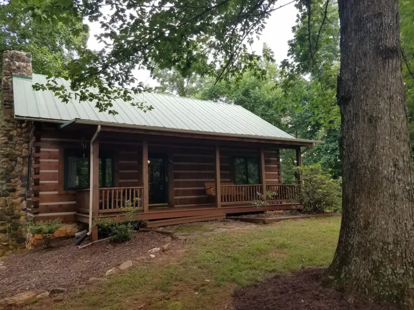 Charming Log Home with Pond on 27 Acres with Mountain Views - Image 1