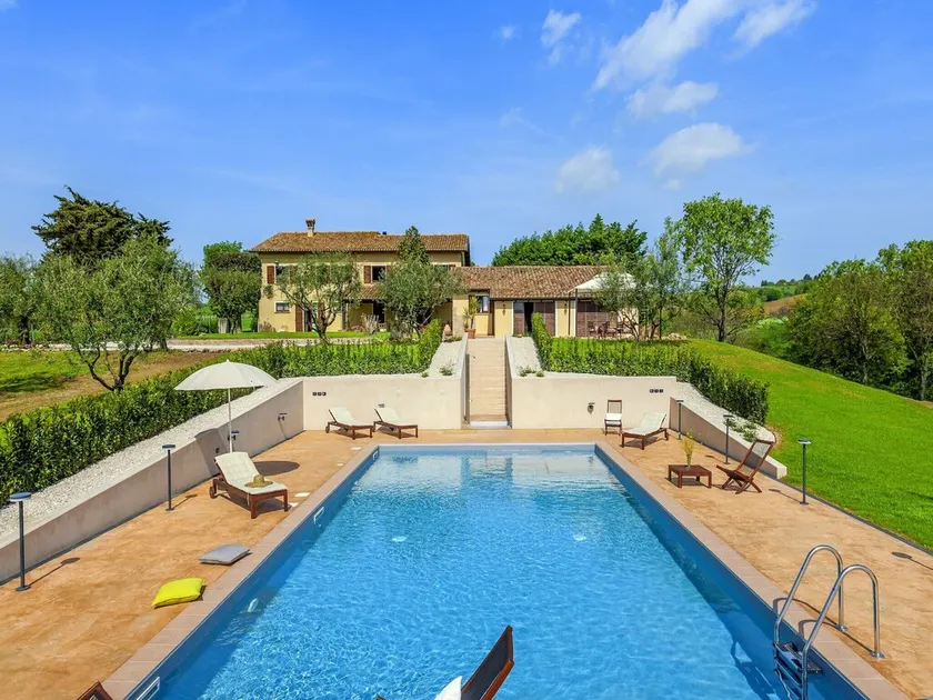 Inviting Holiday Home in San Costanzo with Swimming Pool - Image 1