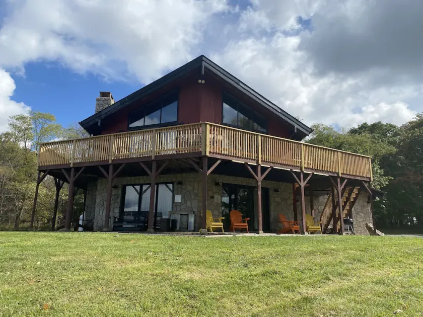 The eclectic lodge sits on 10 acres and is within 40 minutes from 3 ski resorts.  - Image 1