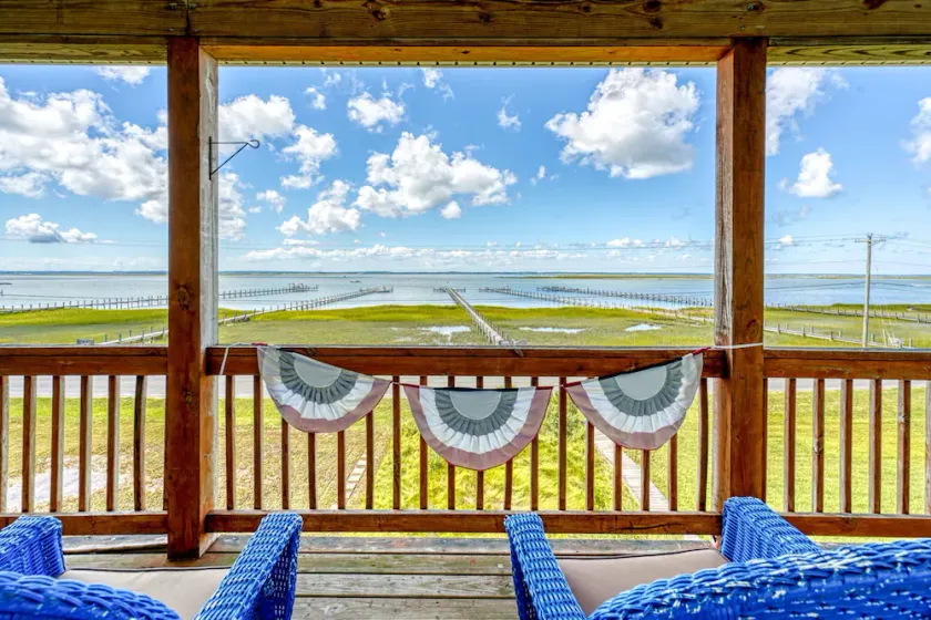 Blue Chair Bay | South Main Bayfront w/ 2-Level Screened Porches, Sunset Views & Shared Pier - Image 1