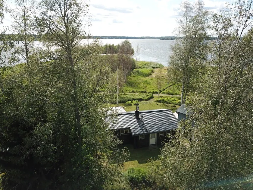 Cozy holiday home by the lake with its own boat - Image 1