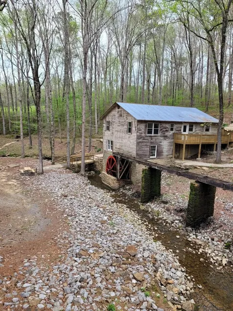 Historic Cabin in a natural setting with waterfalls and covered bridge - Image 1