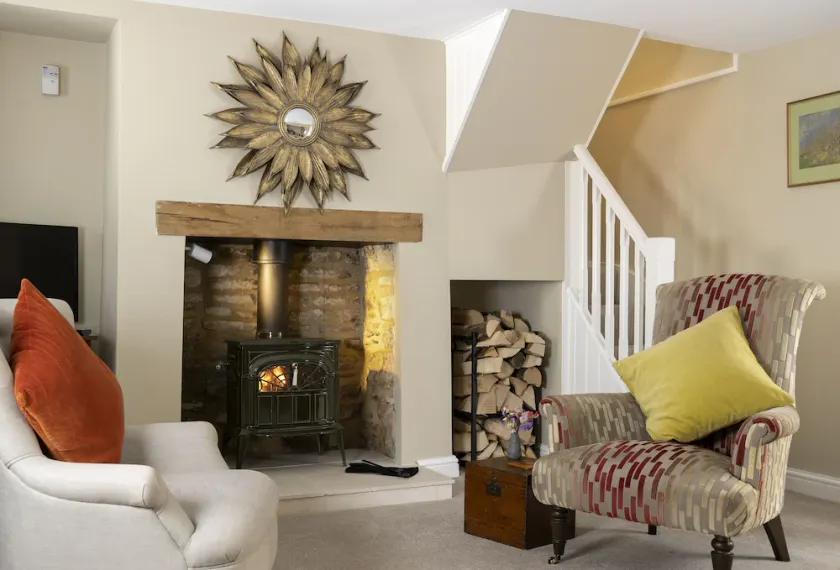 This charming Cotswold stone cottage, elegantly furnished with a seamless blend of antique and conte - Image 1
