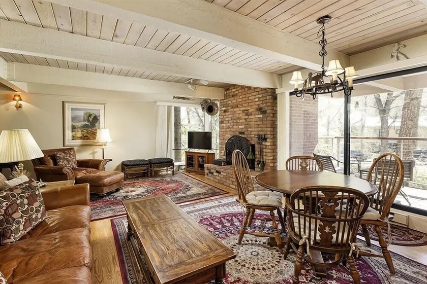 Chateau Eau Claire Unit 18 | Spacious Condo Overlooking the River with a Private Deck - Image 1